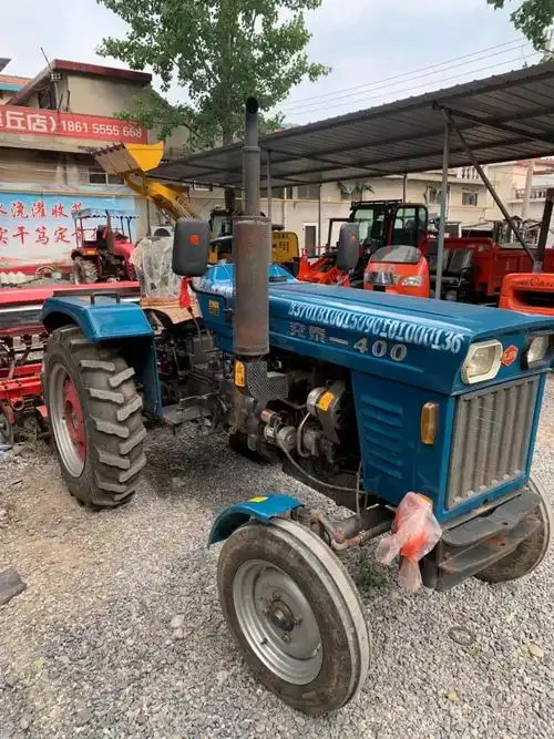 用了一季的泰山400拖拉机带播种机一套九成新带