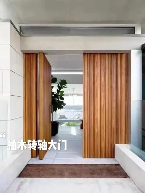 客户拿着图片来订的柚木转轴大门幸亏没翻车