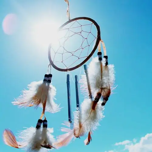 白蓝色捕梦网蓝天照片旅游宣传背景