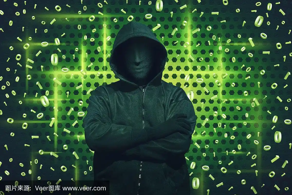 电脑黑客戴着面具站着