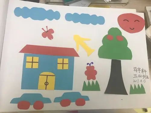 以下是他们的作品 (温馨提示:剪纸画主体是轴对称图形,一小