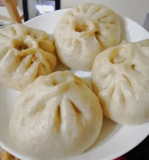 山东大包子:要让包子饱满松软,蒸制方法很关键