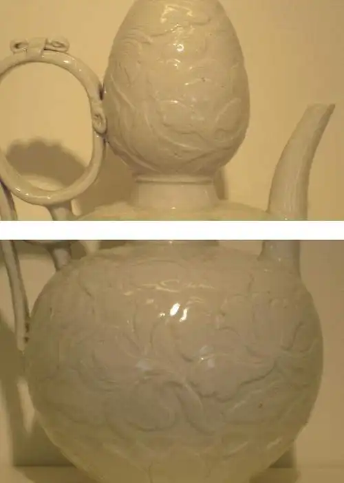 泪痕现象仅见于北宋定窑器,唐至五代定瓷并无此特征.