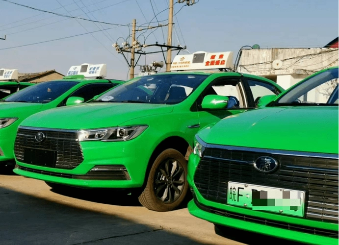 一句话价钱没变传统出租车如何收费新能源出租车就怎么收费所以,小