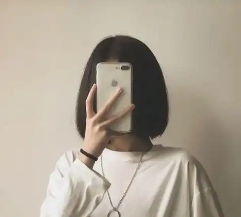 女生对镜子拍照头像