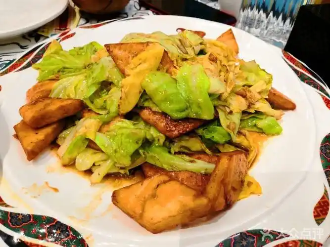 巴依老爷新疆美食(南开大悦城店)包包菜炒馕图片