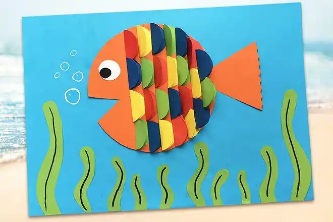 简单立体动物手工:彩色纸拼贴画彩虹鱼(步骤图解)