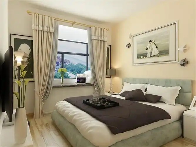 主卧室采用米黄色的墙漆,整体浅色调,使居住者有温馨的感觉,更体现了