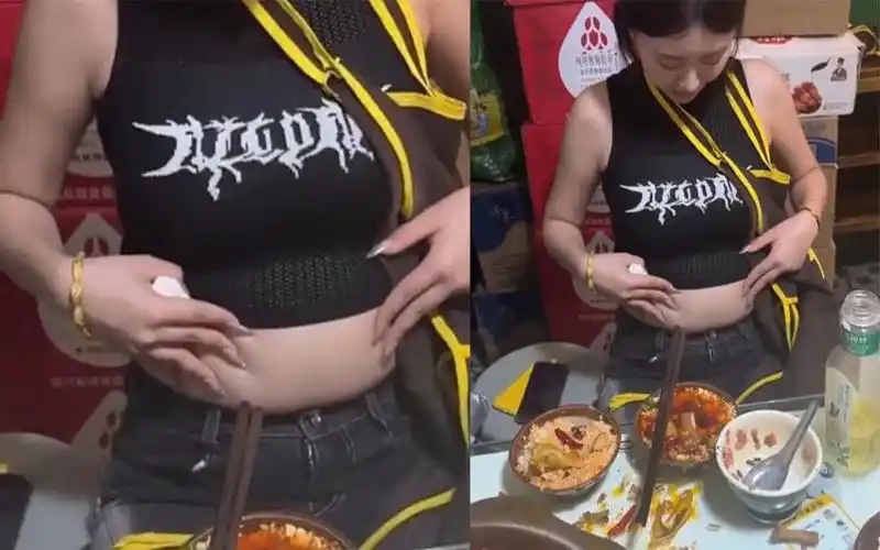 女生晒自己吃饱后的小肚腩,圆滚滚肉乎乎像游泳圈,围裙是遮羞布