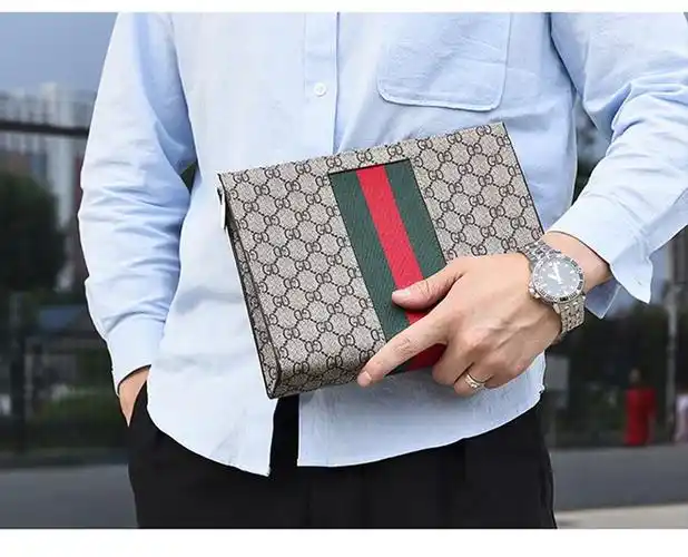 真皮酷奇男包轻奢品牌手包男2021新款手拿包男士手抓包男款软皮公文包