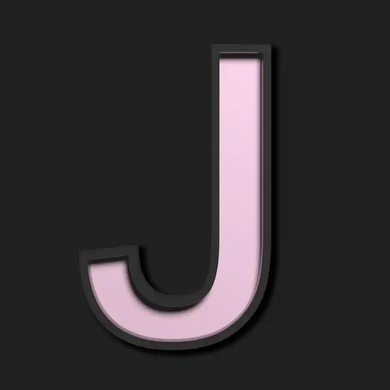 在黑色背景上的柔和大写字母"j"