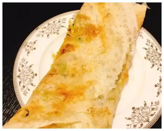 台州天台有一种特色小吃,叫做"糊拉汰",香脆可口,值得品尝