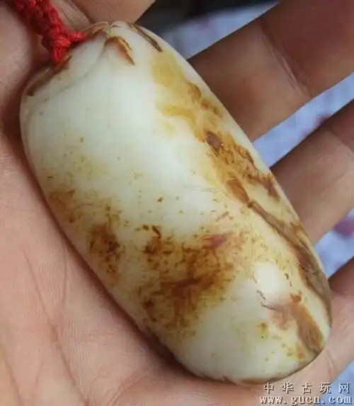 俄白玉籽料天然皮长眉大仙