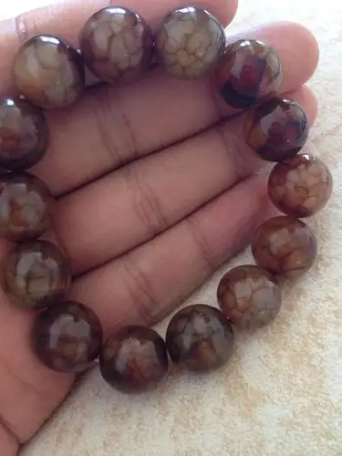 鉴定下这龙纹玛瑙是不是天然的