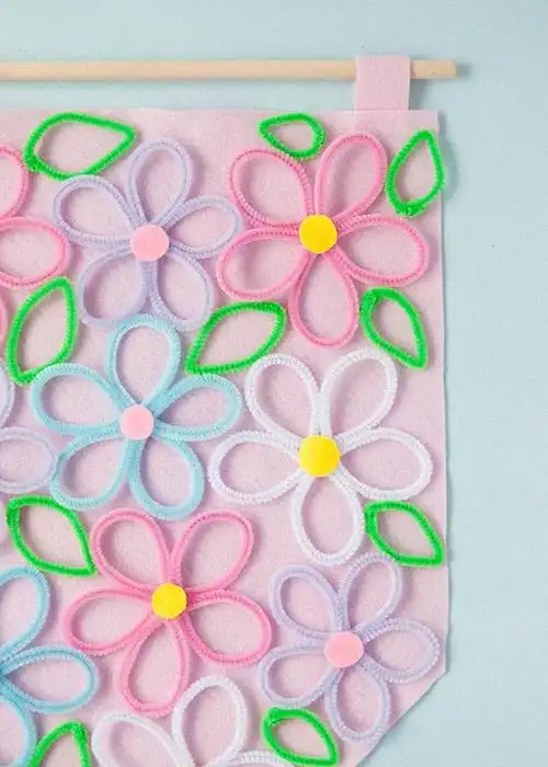 彩色毛根条手工制作花朵图案壁挂装饰(步骤图解)