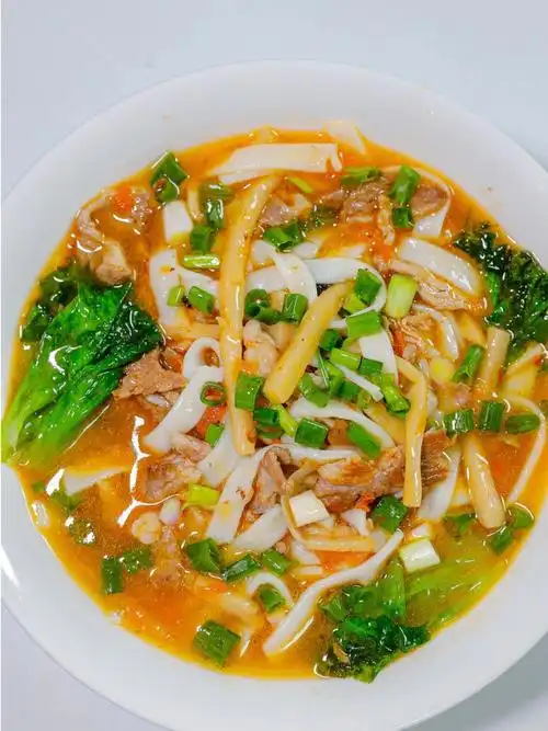 99还原酸辣开胃的广西老友粉