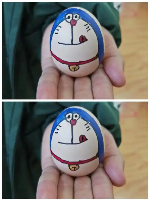 突然一个小朋友开心的走到我面前说:"老师,你看我的哆啦a梦"蛋宝宝!