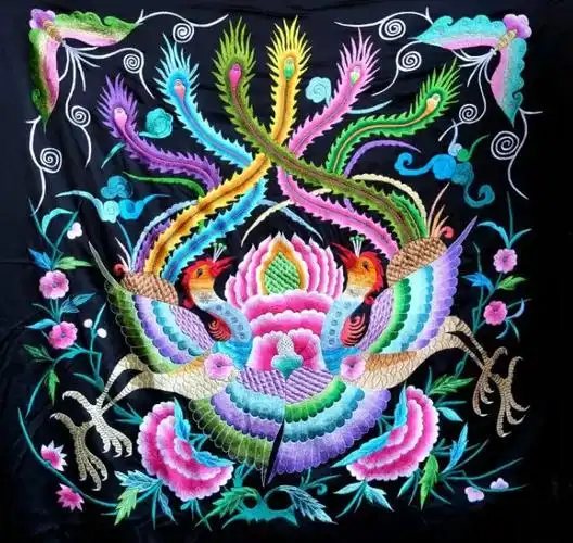 的鱼,桃花,梅花,菊花共生的树……因为苗族妇女热爱大自然中的牡丹花