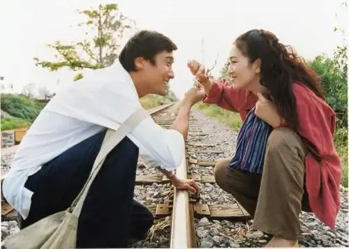 周渔的火车一个女画家和两个男人之间的迷惘爱情与现实抉择