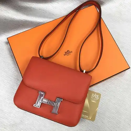 全新hermes 爱马仕 手袋 constance 18 9t 橙色 evercolor 蓝白扣