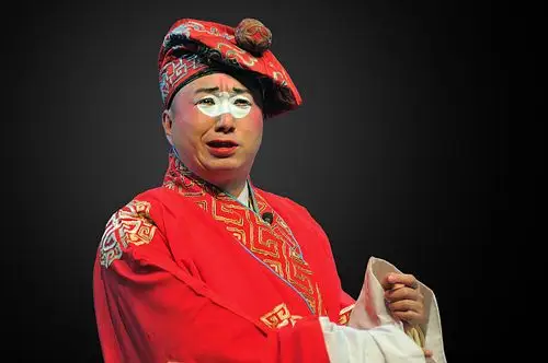 该剧为川剧丑角襟襟丑之名戏.