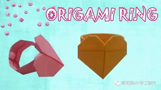 将纸卷起来当一颗心的折纸差不多完成的时候将纸对折成三角形接下来