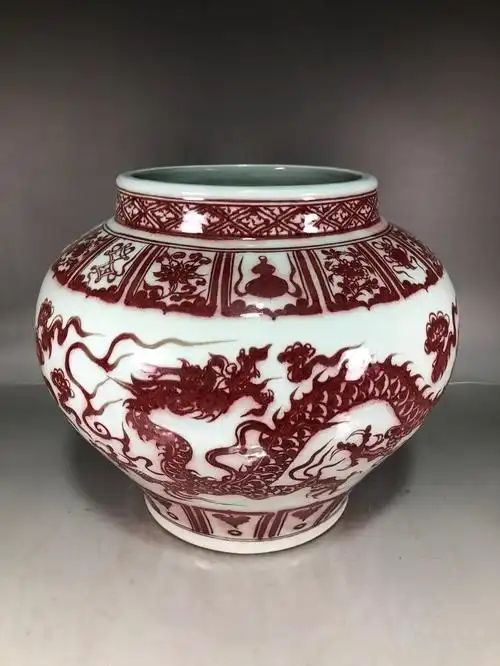 华夏古玩城 瓷器 其它 > 元代釉里红龙纹罐                   描述