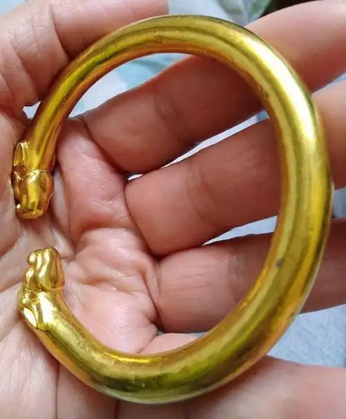 唐代双龙头老黄金手镯-聚德斋-收藏网