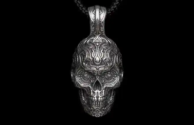 the skull is sculpted from sterling silver, pa