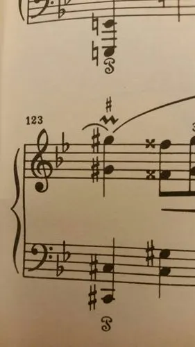 肖邦第一叙事曲的谱子,头上有波浪的这两个音怎么弹?