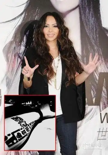 张惠妹男友晒"爱的纹身" 疑好事将近