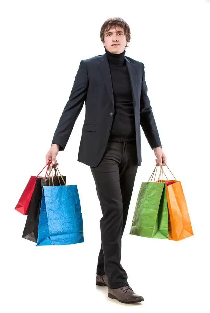 购物,英俊的男人,在白色背景上的购物袋