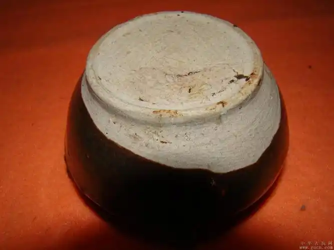 宋定窑酱釉小罐