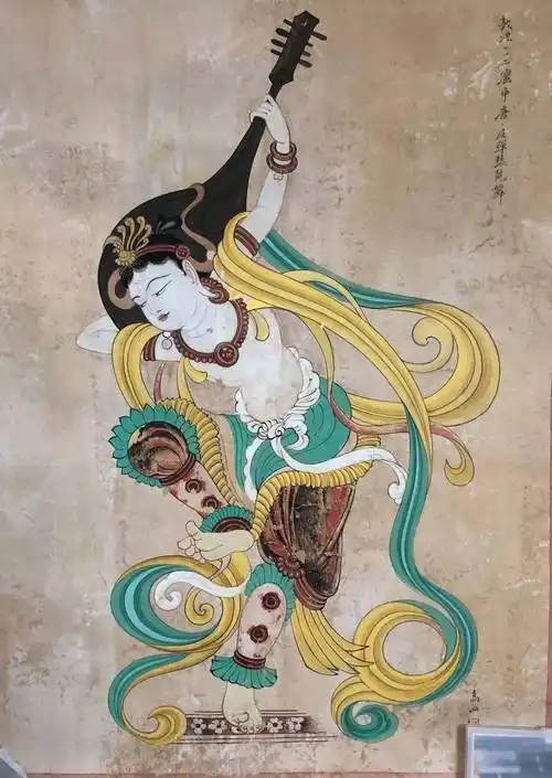 23 / 反弹琵琶舞这是莫高窟仅存的一个小而精的元代洞窟中的壁画.