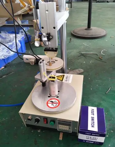 1000rs磁环线圈外围胶带半自动包胶机变压器外围胶布自动包胶机