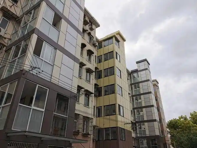 宝山这个小区又有3台电梯投入使用_海滨新村_居民_大楼