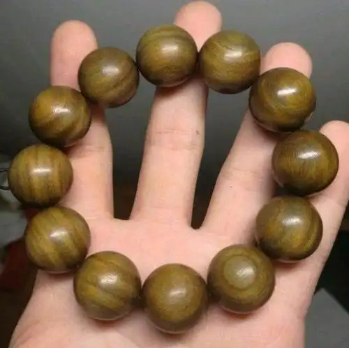 绿檀手串盘玩5年后图片绿檀手串怎么盘玩