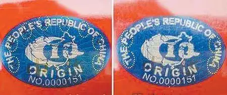 条盒侧边"原产地标志",真烟能看到完整无缺的八颗""及"中华";假烟只能