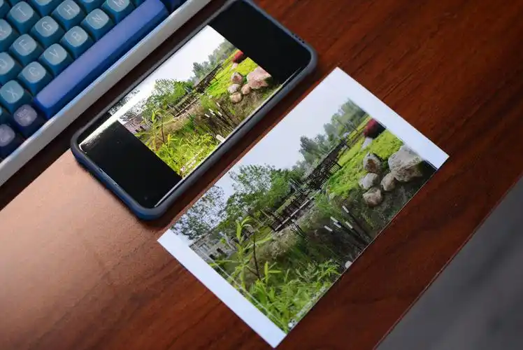 能打印视频的超迷你打印机:汉印照片打印机,独特设计功能强大_屏幕