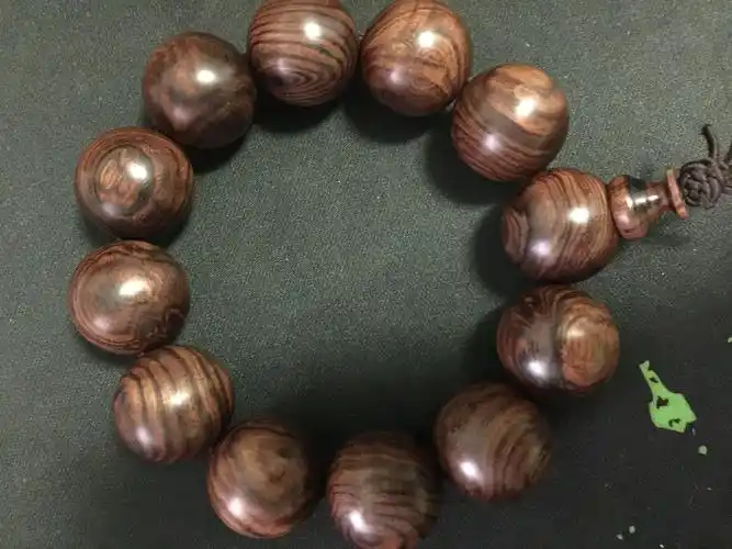 我的黄花梨手串盘乌了吗?