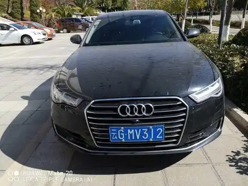 拍卖成功!云南省昆明市一辆车牌号为,云gmv312黑色奥迪a6l轿车