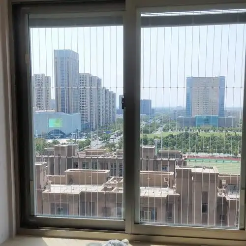 武汉飘窗儿童防护网不锈钢栏窗户装防盗窗楼梯防护连廊护栏隐形