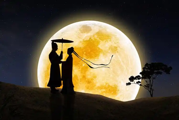 中秋月光下相聚的古装情侣图片下载