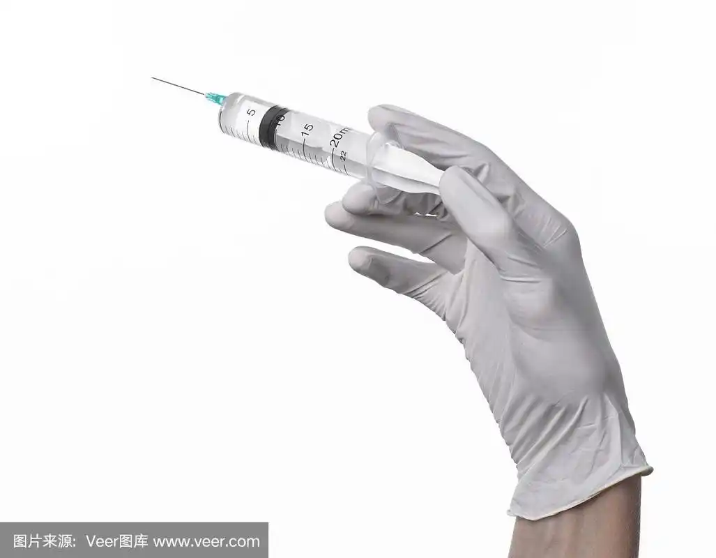 医生的手拿着注射器,戴白手套的手,一个大的注射器,医疗问题,医生做