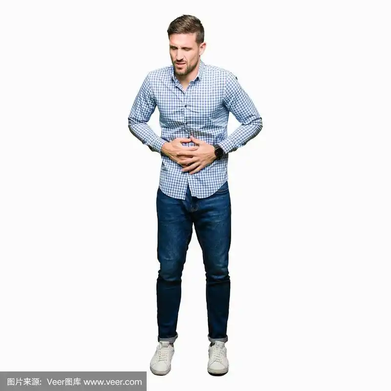 帅气的商人蓝眼睛用手捂着肚子,因为恶心,痛病感觉不舒服.疼痛的概念.