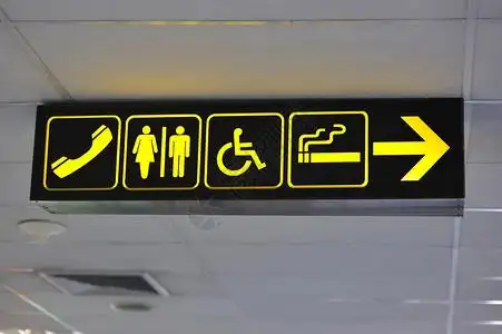 机场厕所标志黑底黄图片
