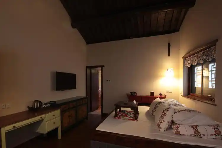 古北水镇八旗温泉客栈营养早餐房间外自带温泉入住可享受优惠购买古北