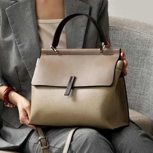 首页 服饰鞋包 女包 女士手提包 laorentou/老人头女士手提包 文章