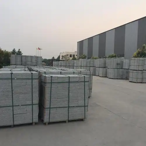 娄底芝麻白厂家火烧板矿山石材603广场高铁墙地面烧面荔枝