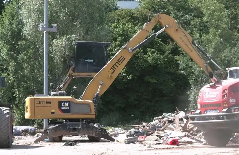 cat mh3026物料搬机,利勃海尔l550装载机作业